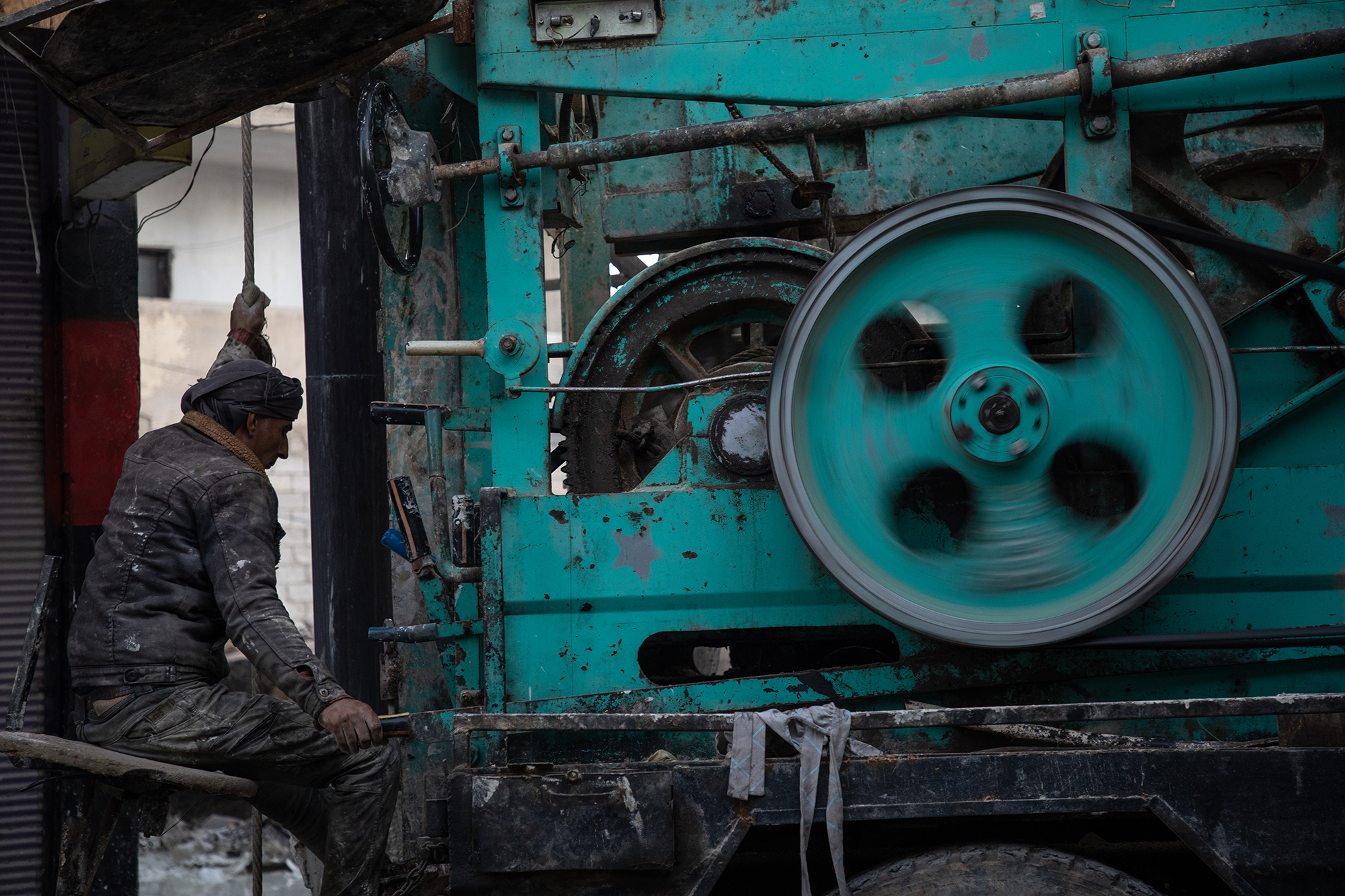 With the water cut in Kobane, generator-powered machinery is used to pump water from wells. The loud hum has become a constant background sound to the city's daily life.
