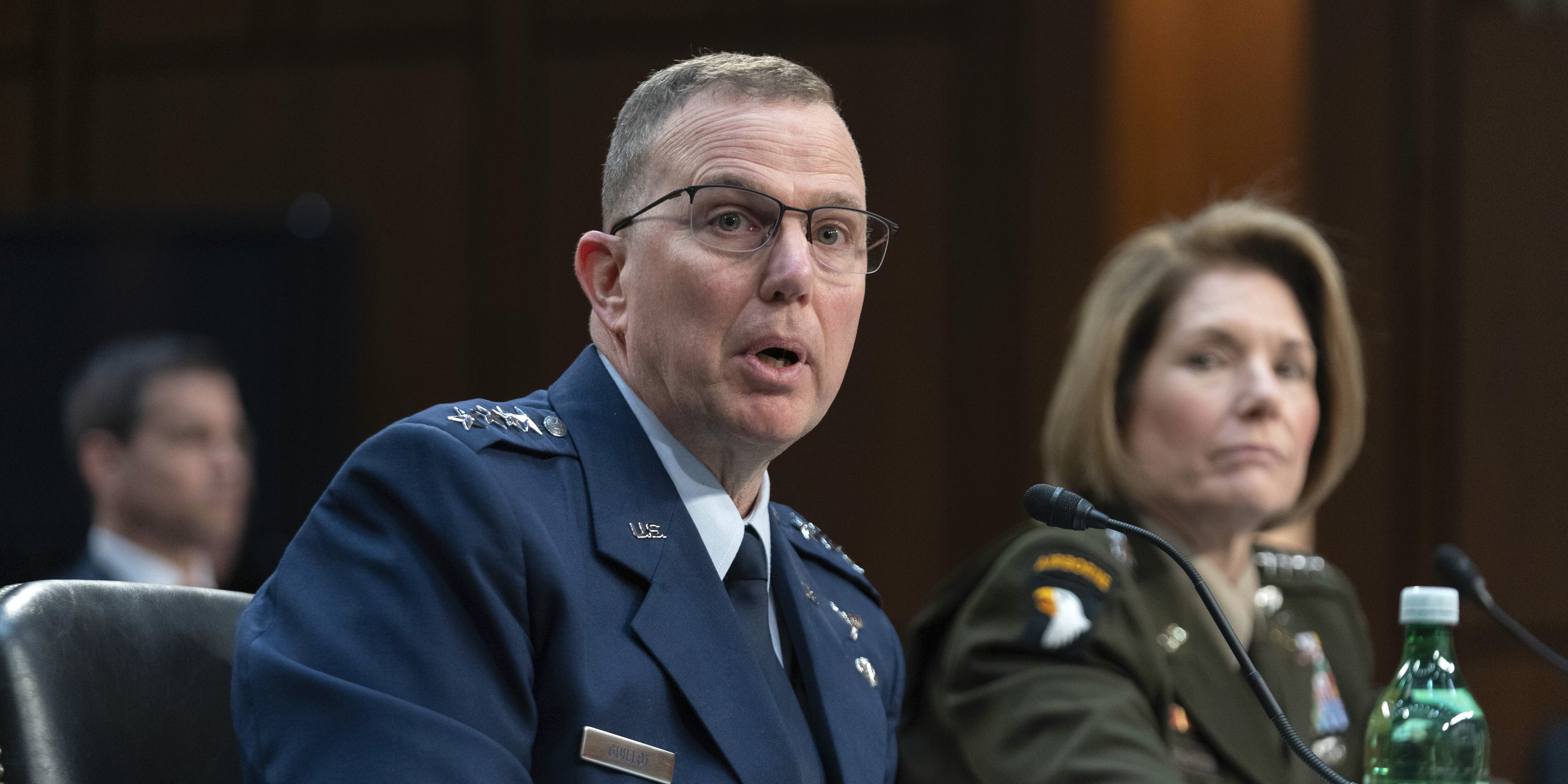 Gen. Gregory Guillot, Air Force Commander, United States Northern Command and North American Aerospace Defense Command, left, and Gen. Laura Richardson, Army Commander, United States Southern Command, testify before the Senate Armed Services Committee on Capitol Hill in Washington, Thursday, March 14, 2024.