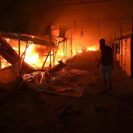 Fire sweeps through tents in the courtyard of Al Aqsa Martyrs hospital in Deir al-Balah, Gaza Strip, Oct. 14, 2024, after an Israeli strike.