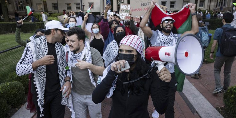Mahmoud Khalil, second from left, protests at Columbia University, Thursday, Oct. 12, 2023, in New York.
