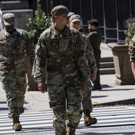 Guardsmen and women leave the D.C. National Guard Headquarters after a briefing on August 12, 2025 in Washington, D.C.