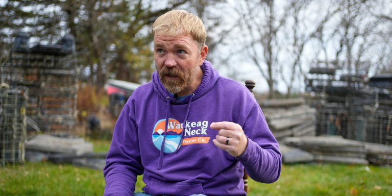 Graham Platner, Democratic candidate for U.S. Senate, speaks to a reporter at his home, Monday, Nov. 3, 2025, in Sullivan, Maine. (AP Photo/Robert F. Bukaty)