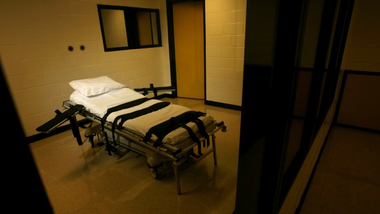 The gurney used for lethal injections sits behind glass windows in a small cinder block building at the Georgia Diagnostic and Classification Prison in Jackson, Ga., Sept. 7, 2007.