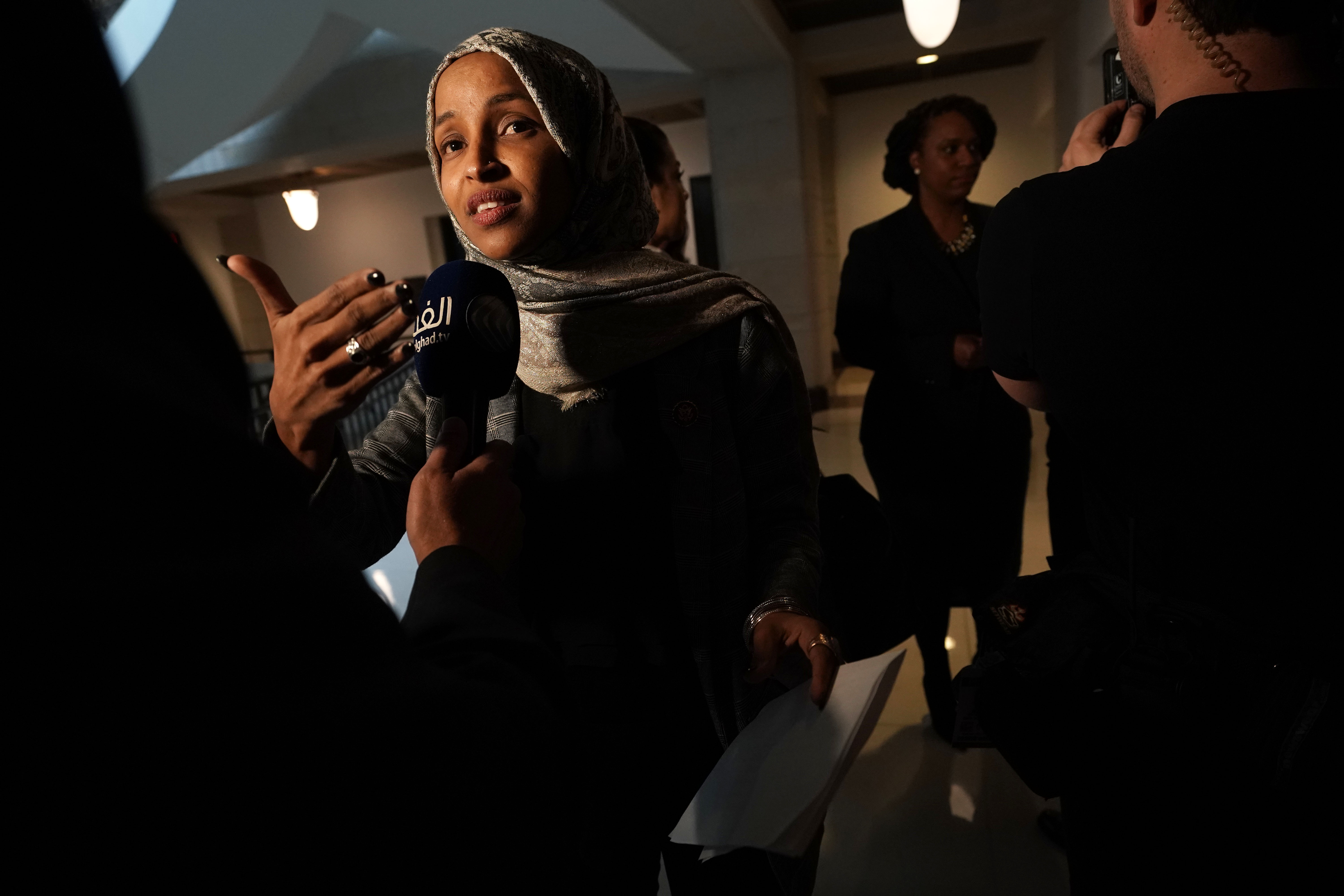 WASHINGTON, DC - JANUARY 24:   U.S. Rep. Ilhan Omar (D-MN) (L) and Rep. Ayanna Pressley (D-MA) (R) speak to members of the media after a news conference January 24, 2019 on Capitol Hill in Washington, DC. The Democratic Congresswomen held a news conference on legislation providing childcare for workers affected by the ongoing government shutdown. (Photo by Alex Wong/Getty Images)
