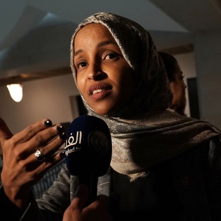 WASHINGTON, DC - JANUARY 24:   U.S. Rep. Ilhan Omar (D-MN) (L) and Rep. Ayanna Pressley (D-MA) (R) speak to members of the media after a news conference January 24, 2019 on Capitol Hill in Washington, DC. The Democratic Congresswomen held a news conference on legislation providing childcare for workers affected by the ongoing government shutdown. (Photo by Alex Wong/Getty Images)