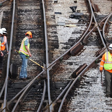 Workers service the tracks at the Metra/BNSF railroad yard on September 13, 2022 in Chicago, Illinois.
