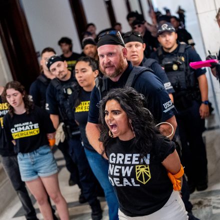 WASHINGTON, DC - JULY 29: Members of the Sunrise Movement are arrested as they protest outside the Senate office of Republican vice presidential nominee, U.S. Sen. J.D. Vance (R-OH) on Capitol Hill on July 29, 2024 in Washington, DC. The Sunrise Movement, a climate change political action group, held signs accusing Vance of being in the pocket of big oil companies. (Photo by Andrew Harnik/Getty Images)