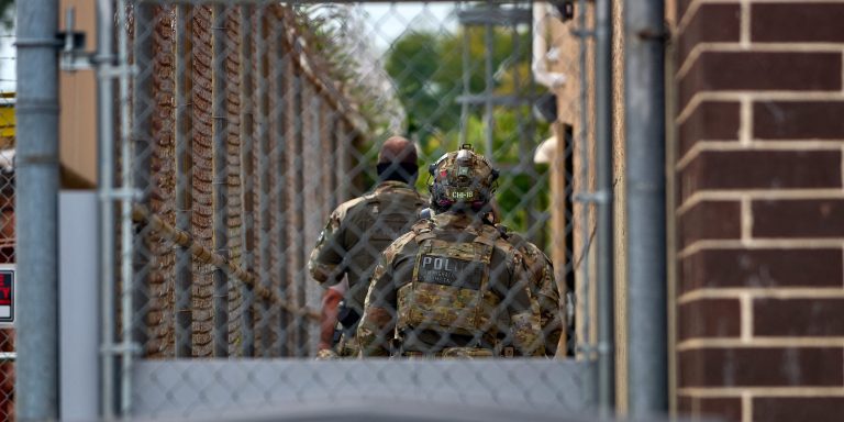 Federal agents at the suburban Chicago ICE Detention Center in Broadview, IL after a morning of violent confrontations between federal agents and activists. Sept. 19, 2025. (Photo by Dominic Gwinn / Middle East Images via AFP) (Photo by DOMINIC GWINN/Middle East Images/AFP via Getty Images)
