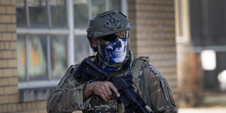 BROADVIEW, ILLINOIS - SEPTEMBER 26: Federal law enforcement agents confront demonstrators protesting outside of an immigration processing center on September 26, 2025 in Broadview, Illinois. The demonstrators, protesting a recent surge in ICE activity in the Chicago area, were pushed back from the facility with a barrage of "less lethal" munitions including stinger ball grenades, pepper balls, tear gas and baton rounds. (Photo by Scott Olson/Getty Images)