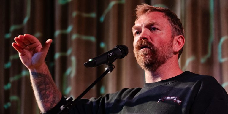 OGUNQUIT, MAINE - OCTOBER 22: U.S. senatorial candidate from Maine Graham Platner speaks at a town hall at the Leavitt Theater on October 22, 2025 in Ogunquit, Maine. Platner, a veteran of the U.S. Marines and an oyster farmer, is running for the seat held by Sen. Susan Collins (R-ME). (Photo by Sophie Park/Getty Images)