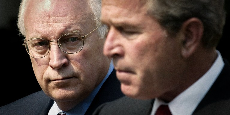 WASHINGTON, UNITED STATES:  US President George W. Bush (R), along with Vice President Dick Cheney (L), speaks prior to signing the Project BioShield Act of 2004, in a White House Rose Garden ceremony 21 July, 2004, in Washington, DC. The act aims at building vaccines and other countermeasures against chemical and biolobigical weapons. "Every American can be certain that their government will continue doing everything in our power to prevent a terrorist attack and, if the terrorists do strike, we'll be better prepared to defend our people because of the good law I sign today," Bush said. AFP Photo/Stephen JAFFE  (Photo credit should read STEPHEN JAFFE/AFP via Getty Images)